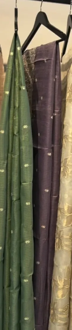 Sage green and ivory sarees with small woven motifs